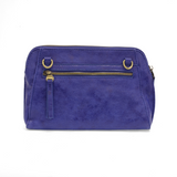 Retro styling crafted in antiqued vegan leather gives this cobalt clutch a vintage vibe. The removable woven wrist strap is the finishing touch on this stylish bag, so you can wear as a wristlet, a clutch, or even a crossbody with the included removable shoulder strap!





6.75"H x 9.75"W x 2.25"D

Removable and adjustable crossbody strap 22"-26"

Removable long wristlet strap 7.5" long

Zippered top closure

Interior zippered pocket

Exterior back zipper pocket

Brass plated hardware

100% vegan leather (
