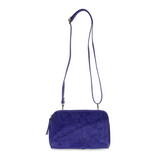 Retro styling crafted in antiqued vegan leather gives this cobalt clutch a vintage vibe. The removable woven wrist strap is the finishing touch on this stylish bag, so you can wear as a wristlet, a clutch, or even a crossbody with the included removable shoulder strap!





6.75"H x 9.75"W x 2.25"D

Removable and adjustable crossbody strap 22"-26"

Removable long wristlet strap 7.5" long

Zippered top closure

Interior zippered pocket

Exterior back zipper pocket

Brass plated hardware

100% vegan leather (