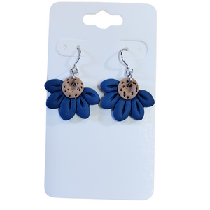 You will love these lightweight, trendy polymer clay daisy earrings that are the cutest! This one has five smooth petals in navy with earring hooks are comfortable and easy to wear and made of high-quality, strong/durable stainless steel, which is hypoallergenic and nickel-free. *&nbsp;

This versatile earring design would accompany any outfit, from casual to dressed up!&nbsp;

Handcrafted in Texas, USA&nbsp;

CARE INSTRUCTIONS FOR EARRINGS * Store in a clean, dry place. * To clean: rub gently with a soft c