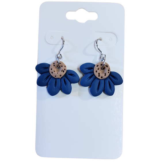 You will love these lightweight, trendy polymer clay daisy earrings that are the cutest! This one has five smooth petals in navy with earring hooks are comfortable and easy to wear and made of high-quality, strong/durable stainless steel, which is hypoallergenic and nickel-free. * 

This versatile earring design would accompany any outfit, from casual to dressed up! 

Handcrafted in Texas, USA 

CARE INSTRUCTIONS FOR EARRINGS * Store in a clean, dry place. * To clean: rub gently with a soft c