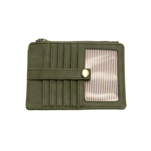 We love this mini wallet in rich, dark, basil-colored vegan leather! It is full of style and will hold your license and up to six credit cards. The zipper pocket is roomy enough for your change and cash, and a pocket is on the back. This mini wallet is perfect for you, but it makes an awesome gift!  DIMENSIONS: 4 IN. H X 5.5 IN. W X .25 IN. D