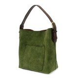 Equally timeless and modern, our best-selling classic hobo is made in rich vegan leather in a beautiful dark emerald faux suede, accented with a brown strap.&nbsp; This roomy bag, accented with a large front pocket and a snap-in removable brown crossbody, has plenty of room to carry your needs in style.