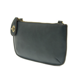 Our most popular bag, this mini clutch, with its sleek silhouette, is as gorgeous as it is versatile.&nbsp; Features include a polished turn lock, six card slots, and an interior zipper for change.&nbsp; It can be styled in many ways, with removable straps to alternate between wallet, crossbody, and wristlet!  &nbsp;5"H x 9.5"W x 1"D