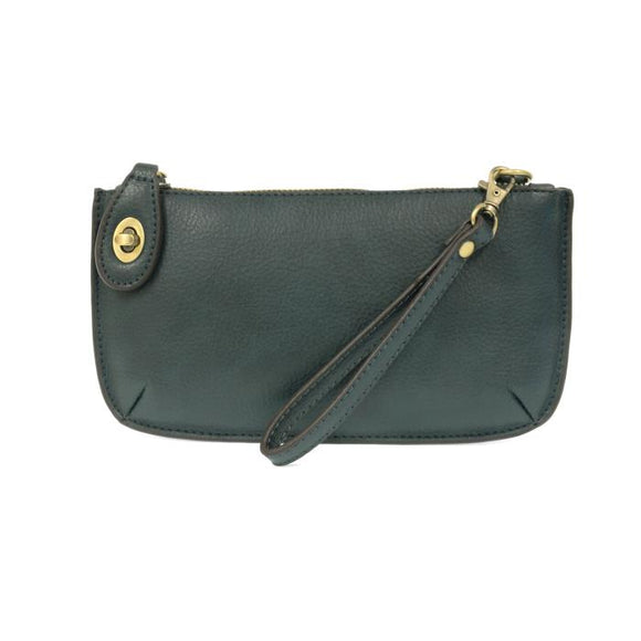 Our most popular bag, this mini clutch, with its sleek silhouette, is as gorgeous as it is versatile.  Features include a polished turn lock, six card slots, and an interior zipper for change.  It can be styled in many ways, with removable straps to alternate between wallet, crossbody, and wristlet!   5