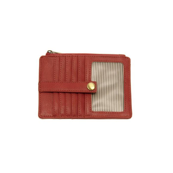 We love this deep berry vegan leather mini wallet! It is full of style and will hold your license and up to six credit cards. The zipper pocket is roomy enough for your change and cash, and a pocket is on the back. This mini wallet is perfect for you, but it makes an awesome gift!  DIMENSIONS: 4 IN. H X 5.5 IN. W X .25 IN. D