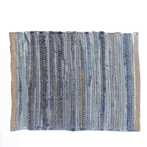 Need to add a little texture to your home? You'll love this incredibly stylish hand-woven, denim-colored reversible placemat crafted using recycled denim and jute yarns. Sustainable and durable, these runners&nbsp;will surely enrich the décor of any surface in your home.  14" W x 19"L  Spot clean only.  75% Recycled denim, 25% jute  Handmade in India