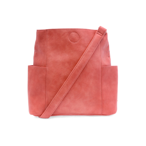 Casual and carefree crossbody in super soft pebble grain vegan leather! Our Kayleigh bucket bag in a beautiful desert coral color comes with a smaller bag that can be carried inside or used alone! The convenient side pockets of this bucket bag can carry your water bottle, phone or glasses. 


11