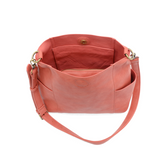 Casual and carefree crossbody in super soft pebble grain vegan leather! Our Kayleigh bucket bag in a beautiful desert coral color&nbsp;comes with a smaller bag that can be carried inside or used alone! The convenient side pockets of this bucket bag can carry your water bottle, phone or glasses.&nbsp;


11" W X 11.25" H X 3.5"
Magnetic Snap Closure
2 open and 1 zipper interior pockets
2 exterior open pockets and 1 back zipper pocket
12- 18" adjustable drop and detachable crossbody strap with lobster claw cla