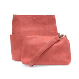 Casual and carefree crossbody in super soft pebble grain vegan leather! Our Kayleigh bucket bag in a beautiful desert coral color&nbsp;comes with a smaller bag that can be carried inside or used alone! The convenient side pockets of this bucket bag can carry your water bottle, phone or glasses.&nbsp;


11" W X 11.25" H X 3.5"
Magnetic Snap Closure
2 open and 1 zipper interior pockets
2 exterior open pockets and 1 back zipper pocket
12- 18" adjustable drop and detachable crossbody strap with lobster claw cla
