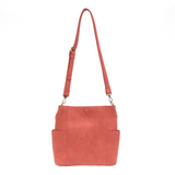 Casual and carefree crossbody in super soft pebble grain vegan leather! Our Kayleigh bucket bag in a beautiful desert coral color&nbsp;comes with a smaller bag that can be carried inside or used alone! The convenient side pockets of this bucket bag can carry your water bottle, phone or glasses.&nbsp;


11" W X 11.25" H X 3.5"
Magnetic Snap Closure
2 open and 1 zipper interior pockets
2 exterior open pockets and 1 back zipper pocket
12- 18" adjustable drop and detachable crossbody strap with lobster claw cla