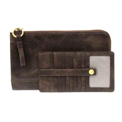 The Karina combines sleek styling with uber organization in beautiful antique-looking dark oak vegan leather! The ultimate in versatility, this bag can be worn as a crossbody, carried as a clutch, or as a wristlet.  The included bonus wallet with credit card slots, ID windows, zippered change pocket, and billfold will keep you organized on the go and can be carried separately! MAIN BAG: 9