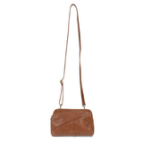 Retro styling crafted in antiqued vegan leather gives this brown clutch a vintage vibe. The removable woven wrist strap is the finishing touch on this stylish bag so that you can wear it as a wristlet, clutch, or crossbody with the included removable shoulder strap!