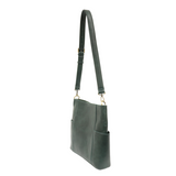 Casual and carefree crossbody in super soft pebble grain vegan leather! Our Kayleigh bucket bag in a beautiful green-opal color comes with a smaller bag that can be carried inside or used alone! The convenient side pockets of this bucket bag can carry your water bottle, phone, or glasses.  11" W X 11.25" H X 3.5"