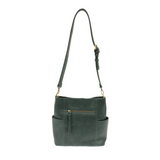 Casual and carefree crossbody in super soft pebble grain vegan leather! Our Kayleigh bucket bag in a beautiful green-opal color comes with a smaller bag that can be carried inside or used alone! The convenient side pockets of this bucket bag can carry your water bottle, phone, or glasses.  11" W X 11.25" H X 3.5"