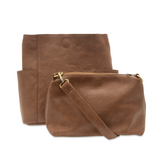 Casual and carefree crossbody in super soft pebble grain vegan leather! Our Kayleigh bucket bag in a beautiful walnut color comes with a smaller bag in the same color that can be carried inside or used alone! The convenient side pockets of this bucket bag can carry your water bottle, phone, or glasses.  11" W X 11.25" H X 3.5"