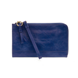 The Karina combines sleek styling with uber organization in beautiful antique-looking&nbsp; Monaco blue vegan leather! This bag has the ultimate versatility, as it can be worn as a crossbody, a clutch, or a wristlet. The included bonus wallet with credit card slots, ID windows, zippered change pocket, and billfold will keep you organized on the go and can be carried separately!