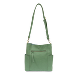 Casual and carefree crossbody in super soft pebble grain vegan leather! Our Kayleigh bucket bag is in a beautiful seafoam green color and comes with a smaller bag that can be carried inside or used alone! The convenient side pockets of this bucket bag can carry your water bottle, phone, or glasses.&nbsp;