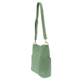 Casual and carefree crossbody in super soft pebble grain vegan leather! Our Kayleigh bucket bag is in a beautiful seafoam green color and comes with a smaller bag that can be carried inside or used alone! The convenient side pockets of this bucket bag can carry your water bottle, phone, or glasses.&nbsp;