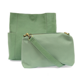 Casual and carefree crossbody in super soft pebble grain vegan leather! Our Kayleigh bucket bag is in a beautiful seafoam green color and comes with a smaller bag that can be carried inside or used alone! The convenient side pockets of this bucket bag can carry your water bottle, phone, or glasses.&nbsp;