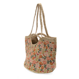 Beautiful hand painted daisies in shades of coral and pink adorn this oversized tote handcrafted from all natural jute fibers. The natural braided jute handles and built in shoulder strap make the Anya Tote easy to carry for carefree summer days.
Product Details
Dimensions: 12 in. H x 19 in. W x 11 in. D
Open topHandles: 4.5 in. drop
Shoulder straps: 10 in. drop
100% Natural Jute with hand painted daisy pattern
Unlined