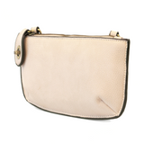 Our most popular bag, in a beautiful cream stone color, this mini clutch, with its sleek silhouette, is as gorgeous as it is versatile.  Features include a polished turn lock, six card slots, and an interior zipper for change.  It can be styled in many ways, with removable straps for alternating between wallet, crossbody, and wristlet!   5"H x 9.5"W x 1"D