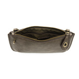 Our most popular bag, in metallic dark chrome color, this mini clutch, with its sleek silhouette, is as gorgeous as it is versatile.  Features include a polished turn lock, six card slots, and an interior zipper for change.  It can be styled in many ways, with removable straps for alternating between wallet, crossbody, and wristlet!   5"H x 9.5"W x 1"D  Removable and adjustable crossbody strap 13"-24"  Wristlet strap 7" long  interior zippered pocket  brass plated hardware  100% vegan leather (polyurethane)