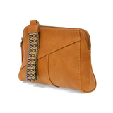 Retro styling crafted in antiqued vegan leather gives this Honey colored clutch a vintage vibe. The removable woven wrist strap is the finishing touch on this stylish bag, so you can wear as a wristlet, a clutch, or even a crossbody with the included removable shoulder strap!   6.75"H x 9.75"W x 2.25"D  Removable and adjustable crossbody strap 22"-26"  Removable long wristlet strap 7.5" long