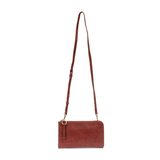 The Karina combines sleek styling with uber organization in beautiful antique-looking currant colored vegan leather! The ultimate in versatility, this bag can be worn as a crossbody, carried as a clutch or as a wristlet.  The included bonus wallet with credit card slots, id windows, zippered change pocket, and billfold will keep you organized on the go and can be carried separately!