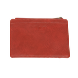 We love this mini wallet in a scarlet red vegan leather! It is full of style and will hold your license and up to six credit cards. The zipper pocket is roomy enough for your change and cash, and a pocket is on the back.  This mini wallet is perfect for you, but it makes an awesome gift!  DIMENSIONS: 4 IN. H X 5.5 IN. W X .25 IN. D