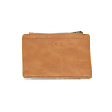 We love this mini wallet in a pretty hazelnut colored vegan leather! It is full of style and will hold your license and up to six credit cards. The zipper pocket is roomy enough for your change and cash, and a pocket is on the back.  This mini wallet is perfect for you, but it makes an awesome gift!  DIMENSIONS: 4 IN. H X 5.5 IN. W X .25 IN. D