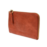 The Karina combines sleek styling with uber organization in beautiful antique-looking spice vegan leather! The ultimate versatility, this bag can be worn as a crossbody, as a clutch, or as a wristlet.  The included bonus wallet with credit card slots, id windows, zippered change pocket, and billfold will keep you organized on the go and can be carried separately!