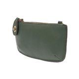 Our most popular bag in a rich chive color! With its sleek silhouette, this mini clutch is as gorgeous as it is versatile.  Features include a polished turn lock, six card slots, and an interior zipper for change.  It can be styled in many ways, with removable straps for alternating between wallet, crossbody, and wristlet!   5"H x 9.5"W x 1"D