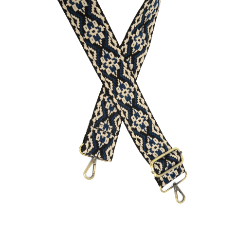 Express your style and add playful hints of pattern to your favorite cross-body or clutch with this guitar strap!  2