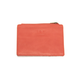 We love this mini wallet in a pretty coral colored vegan leather! It is full of style and will hold your license and up to six credit cards. The zipper pocket is roomy enough for your change and cash, and a pocket is on the back.  This mini wallet is perfect for you, but it makes an awesome gift!  DIMENSIONS: 4 IN. H X 5.5 IN. W X .25 IN. D  ZIPPERED TOP CLOSURE ON EDGE  6 CREDIT CARD POCKETS  ID WINDOW POCKET