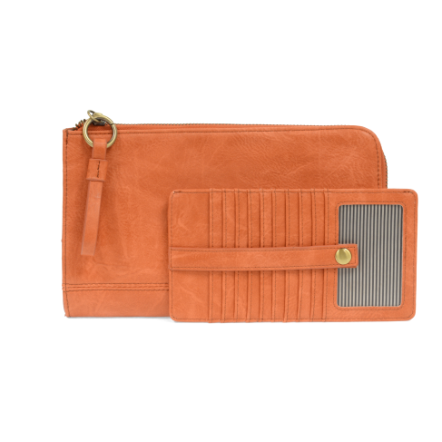 The Karina combines sleek styling with uber organization in beautiful antique-looking melon-colored vegan leather! The ultimate versatility, this bag can be worn as a crossbody, as a clutch, or as a wristlet.  The included bonus wallet with credit card slots, ID windows, zippered change pocket, and billfold will keep you organized on the go and can be carried separately! MAIN BAG: 9