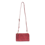 The Karina combines sleek styling with uber organization in beautiful antique-looking magenta-colored vegan leather! The ultimate versatility, this bag can be worn as a crossbody, as a clutch, or as a wristlet.  The included bonus wallet with credit card slots, ID windows, zippered change pocket, and billfold will keep you organized on the go and can be carried separately! MAIN BAG: 9"H x 6"W x 1"D Removable and adjustable crossbody strap 21"-26" with lobster claw clasps