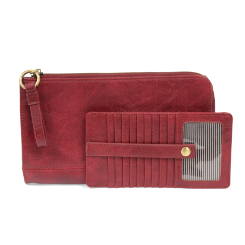 The Karina combines sleek styling with uber organization in beautiful antique-looking magenta-colored vegan leather! The ultimate versatility, this bag can be worn as a crossbody, as a clutch, or as a wristlet.  The included bonus wallet with credit card slots, ID windows, zippered change pocket, and billfold will keep you organized on the go and can be carried separately! MAIN BAG: 9