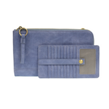 The Karina combines sleek styling with uber organization in pretty antique-looking peri- blue vegan leather! The ultimate versatility, this bag can be worn as a crossbody, as a clutch or as a wristlet.  The included bonus wallet with credit card slots, ID windows, zippered change pocket, and billfold will keep you organized on the go and can be carried separately!