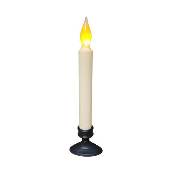 Oh, how we love this candle!  Put it in a window, or use it in your displays!  It will automatically turn on at dusk and off at dawn. How cool is that? It has a realistic flickering amber flame.

To use, remove the bottom section of the candle, turning counterclockwise.  Insert 2 AA alkaline batteries (not included). Replace the bottom of the candle by turning clockwise. The candle will now be on.  Place the candle in the desired location with the photocell facing the light source. 