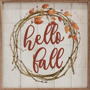 This sweet "hello fall" mini sign has a twig wreath with a few fall leaves up the top of it to greet everyone as they come into the room!