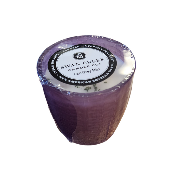 You'll love our cathedral small vase candle. This Earl Grey mist candle has been poured into a pretty basketweave purple glass.

Grab a cup and be prepared to fill your home with a cozy mist of bright citrus, spicy black tea, subdued florals and herbal lavender. Subtle hints of sugared milk, soft vanilla, and dried rosemary add complexity and serve to smooth out the blend. A lovely and peaceful sensory experience for any time of the year- like an indoor picnic for the soul!


Filled with 4.5 oz. of American