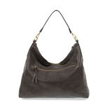 This oversized, slouchy, cool hobo bag is made of tumbled buffalo grain espresso bean colored vegan leather, which gives it that casual boho chic look! With two removable shoulder straps included, you can wear it as a short-shoulder bag or a crossbody bag.  Dimensions: 13.5 in. H x 16 in. W x 3.5 in. D