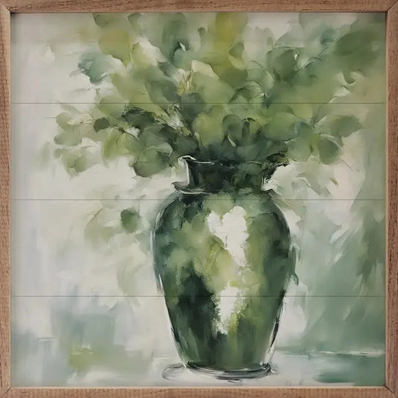 This stunning picture is of a watercolor-style green vase with green eucalyptus coming out of it! It can be paired alone or with other existing artwork that you have.  This unique piece is a simple way to bring beauty and charm to any wall or shelf within the home. It is made from high-quality American hardwood planks with a hand-painted face, printed with UV-cured ink, and is framed in a natural walnut frame.