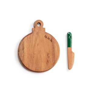 Set the table in style with this mini wood serving board that says "Fa La La" at the top. Included is a wooden spreader with a cream handle. It is so fun to serve your favorite cheeses or munchies on, or as a fun gift idea for your favorite foodie!

5"w x 6.5"h

Acacia wood, Handwash Only, Food Safe