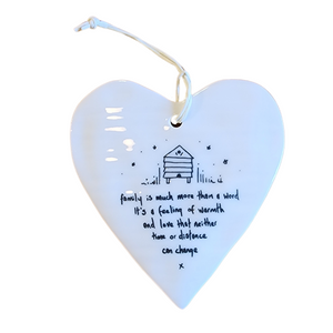 Our "Family is much more than a word it's a feeling of warmth and love that neither time or distance can change" Porcelain Heart Ornament makes a heartfelt gift!

Approximately 3&nbsp;1/2"&nbsp;w x 4"&nbsp;h
