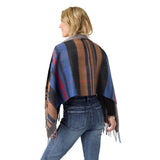 This women’s reversible wrap offers multiple styling options with a versatile design that can be worn on either side for two distinct looks. The button front closure adds structure while allowing for adjustable draping, and the fringe detailing brings movement and texture. Crafted from a soft woven fabric, this layering wrap combines comfort with standout pattern, making it an easy choice for both casual outfits and more styled looks.

Materials: Acrylic/Cotton.