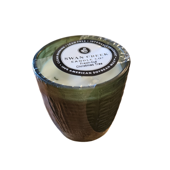 You'll love our cathedral small vase candle. This fresh cut Christmas tree candle has been poured into a pretty basketweave frosted green glass.

Take a trip back to your childhood of heading to town, ice skating, Christmas lights, and the beautiful pine smell of picking out your perfect tree! 

Filled with 4.5 oz. of American Soybean WaxTM. Measures 3