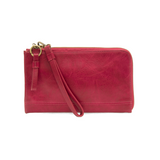 The Karina combines sleek styling with uber organization in beautiful antique-looking wild berry colored vegan leather! The ultimate in versatility, this bag can be worn as a crossbody, carried as a clutch or as a wristlet.&nbsp; The included bonus wallet with credit card slots, id windows, zippered change pocket, and billfold will keep you organized on the go and can be carried separately!


MAIN BAG: 9"H x 6"W x 1"D



Removable and adjustable crossbody strap 21"-26" with lobster claw clasps

Removable lo