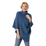 The epitome of cozy, this everyday luxury poncho is crafted from a soft knit fabric in stellar blue, with a rich cable texture that adds depth and dimension. Designed with a relaxed drape and a comfortable turtleneck, it delivers effortless warmth while maintaining an elevated, easy silhouette. The lightweight feel allows for comfortable layering without bulk, making it a versatile piece for both casual and polished styling. Soft. Luxe. and made for all day comfort, this poncho brings refined ease and timel