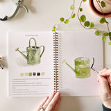 Watercolor workbooks are just like a coloring book, but with watercolor! Enjoy this peaceful hobby on your own, with kids, and with friends. Makes a wonderful gift. Perfect for artists of any age. This Garden Watercolor book has beautiful illustrations of plants, cottages, watering cans &amp; more!

12 beginner-friendly, lightly sketched illustrations

Simple step-by-step instructions and example

Lay flat spiral pages for easy painting

Durable 120 lb watercolor paper

Travel ready 6.5 inch x 9 inch size